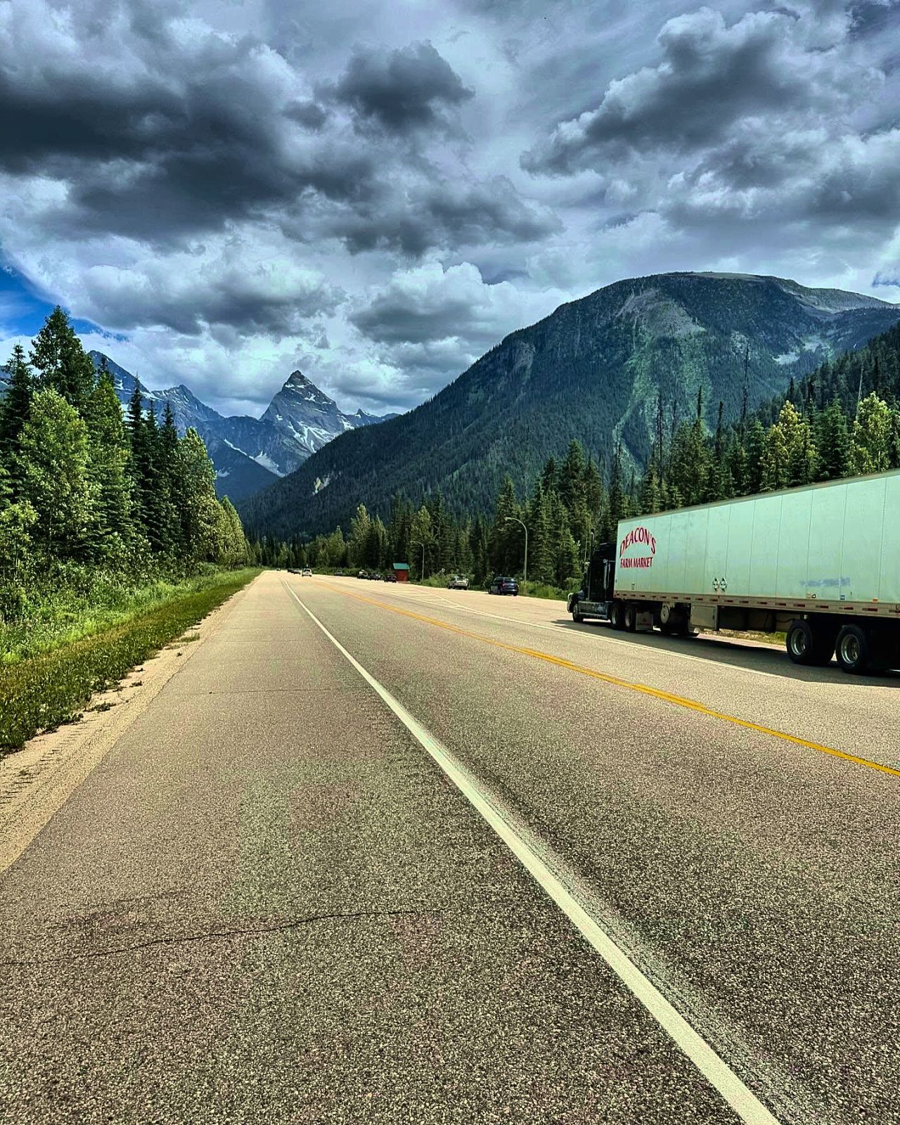 The Deacon's semi trailer on the highway through the Rogers Pass