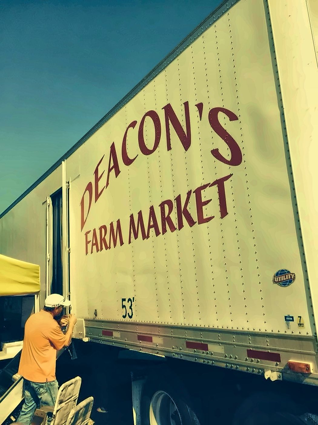 The Deacon's Farm Market lettering on the side of the trailer